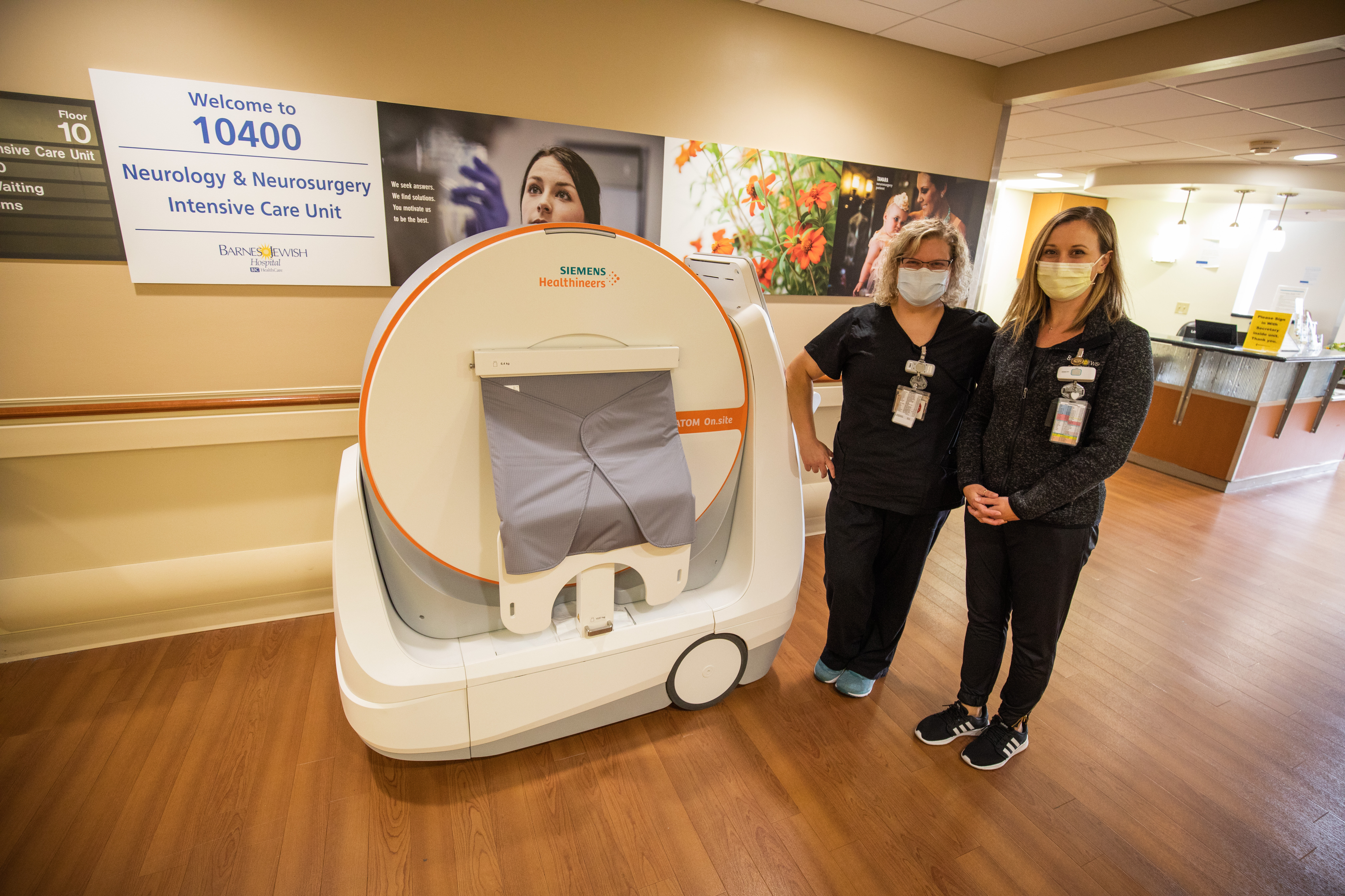 A portable CT scanner and two employees from Barnes Jewish Hospital in St. Louis, Missouri