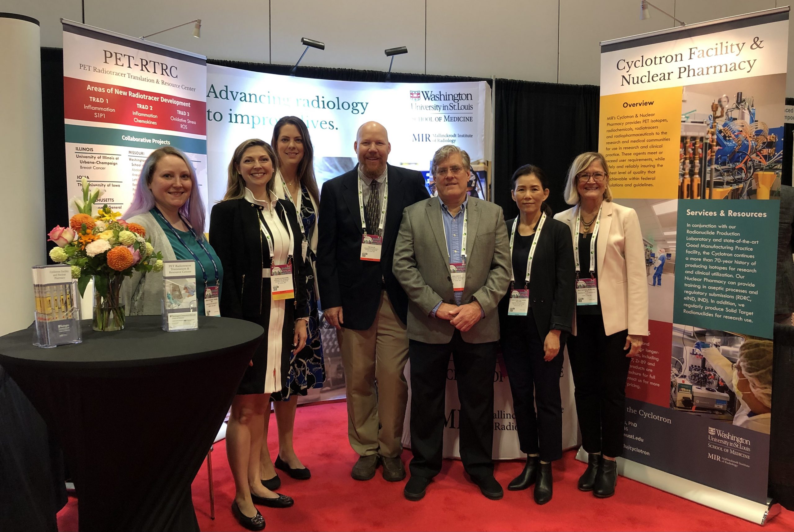 Members of the PET-RTRC and Cyclotron and Nuclear Pharmacy at their booth at the SNMMI Annual Meeting in Vancouver.