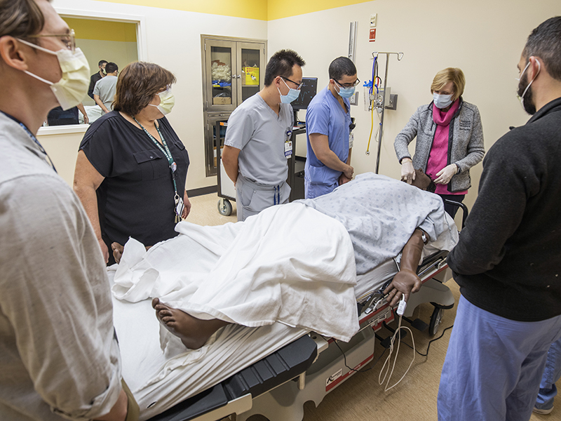 Residents take part in a contrast reaction simulation.