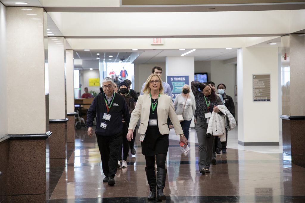 Attendees of the 2024 PET-RTRC Workshops & Scientific Session walk through the halls of Barnes-Jewish Hospital.