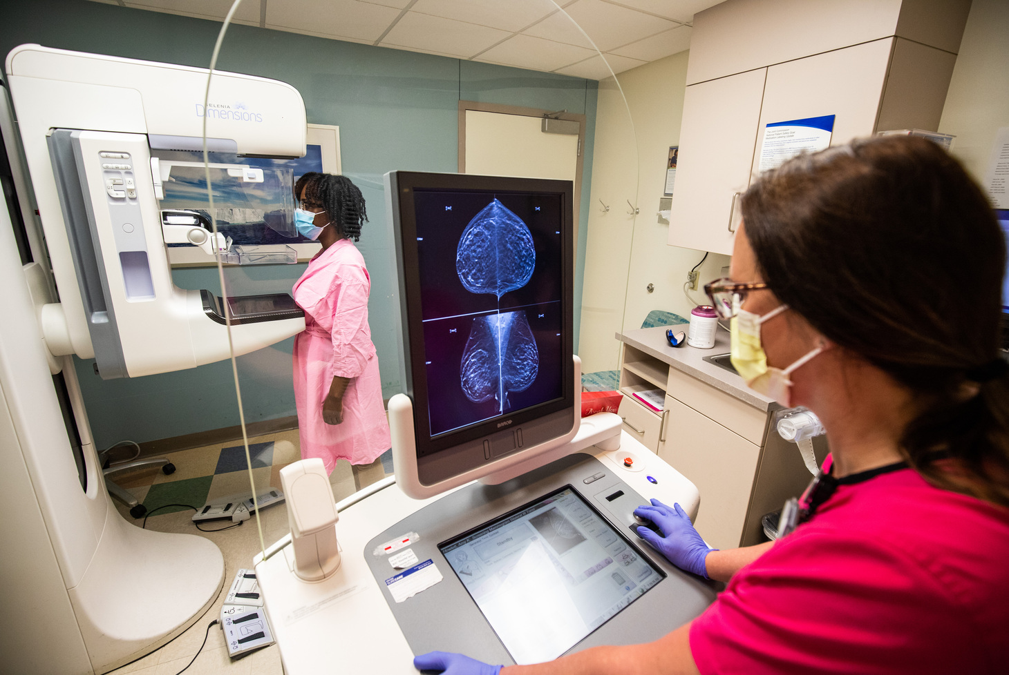 A patient receives a mammogram.